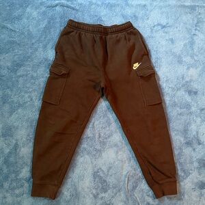 Nike Kids Black Sweatpants with Gold Logo